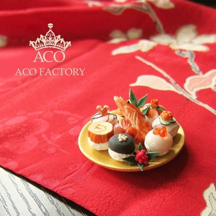 【手毬お節】φ6ｃｍ 樹脂粘土・石塑粘土ほか  ACOのお寿司一月の作品です